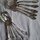 12 Art Nouveau silver-plated cutlery sets with thistle motifs