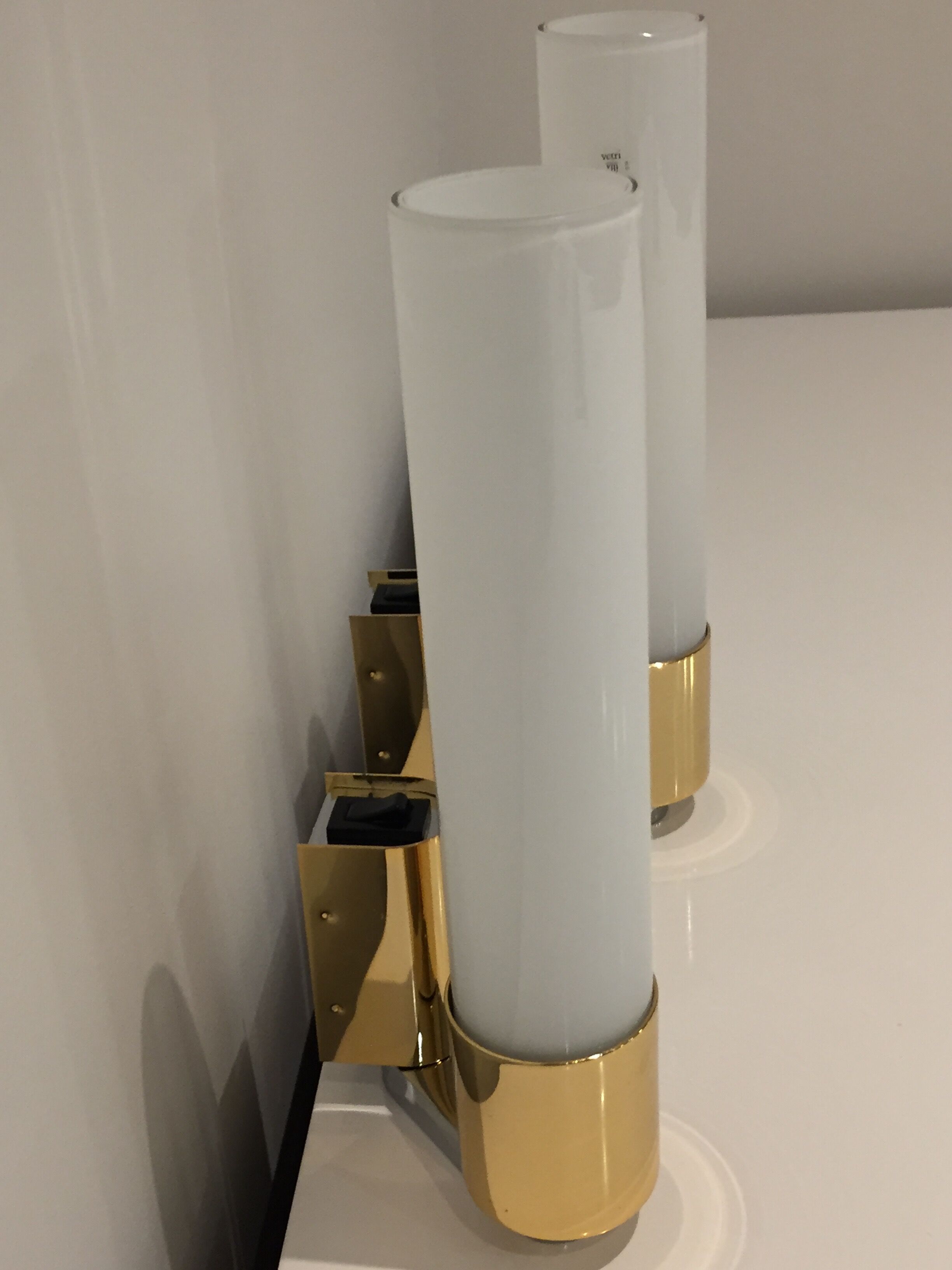 Pair of egoluce vintage orientable wall light in brass and Murano glass, Italy