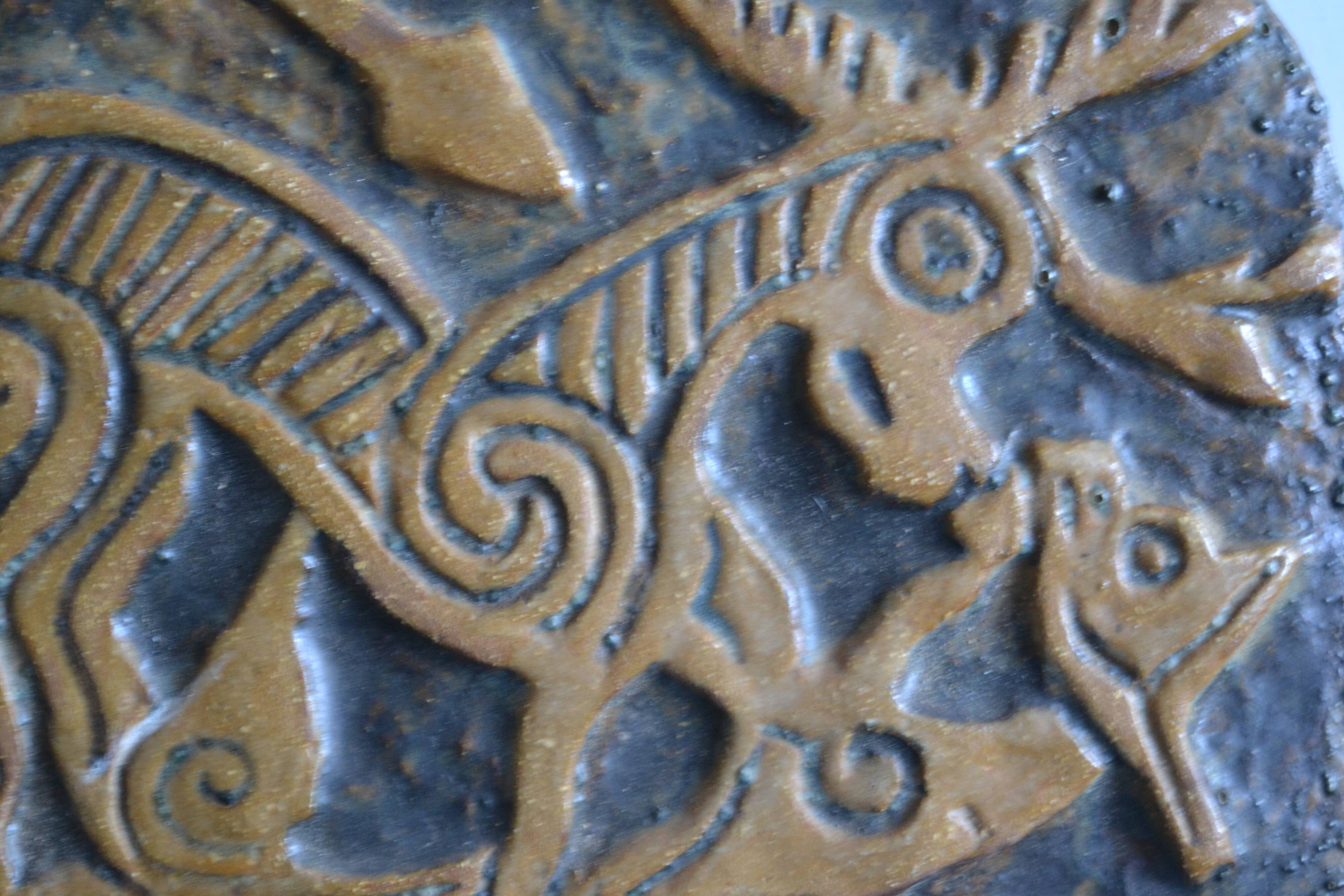 Bas-relief sculpture in terracotta inspired by the Celtic bestiary