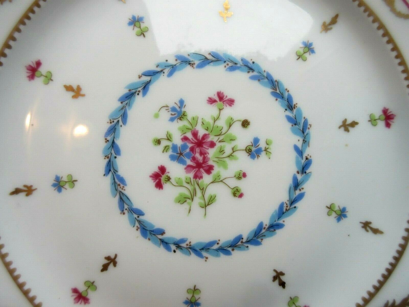 Assiette en porcelaine de Limoges pour Haviland bleue et or