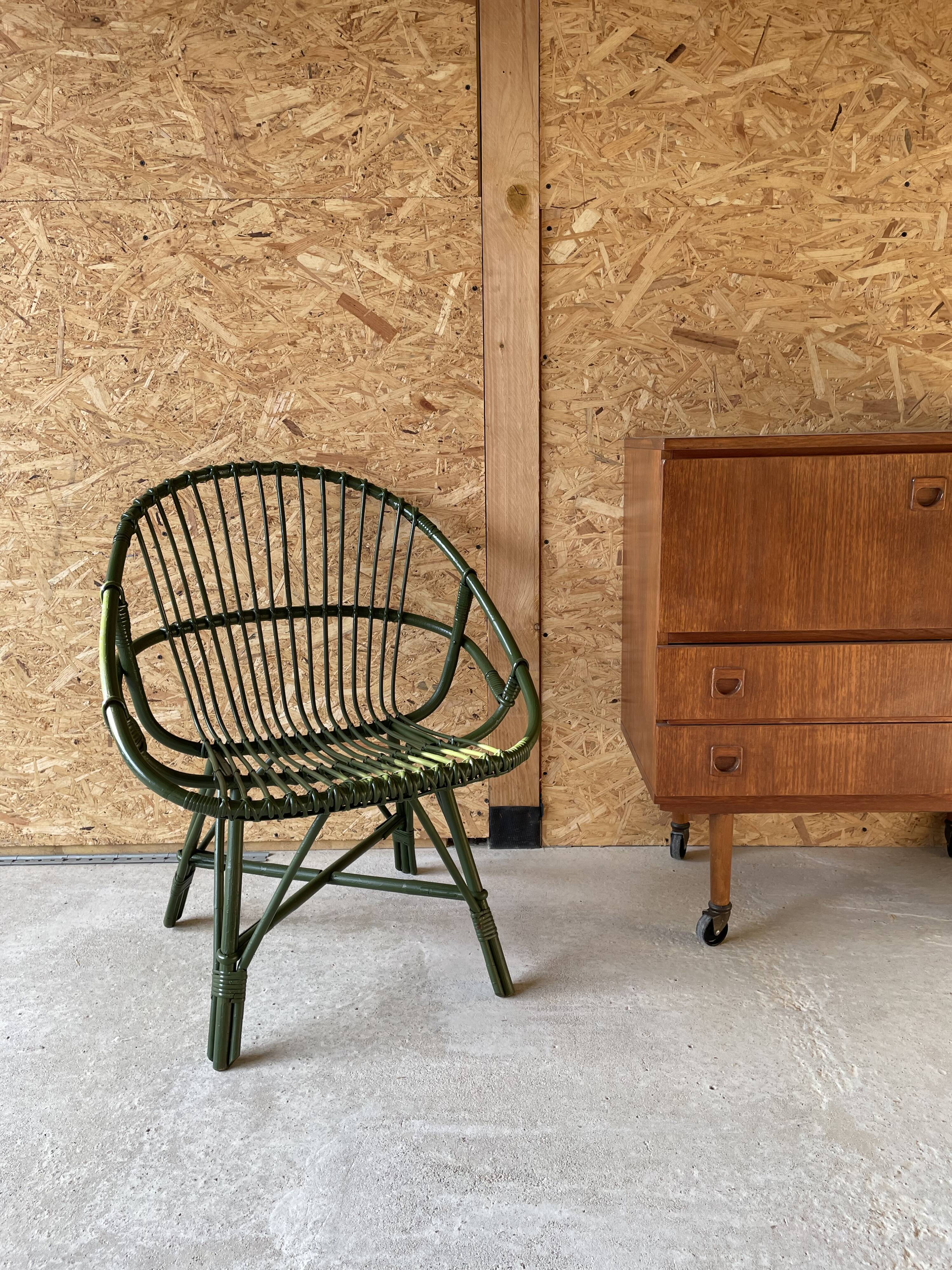 Green rattan armchair