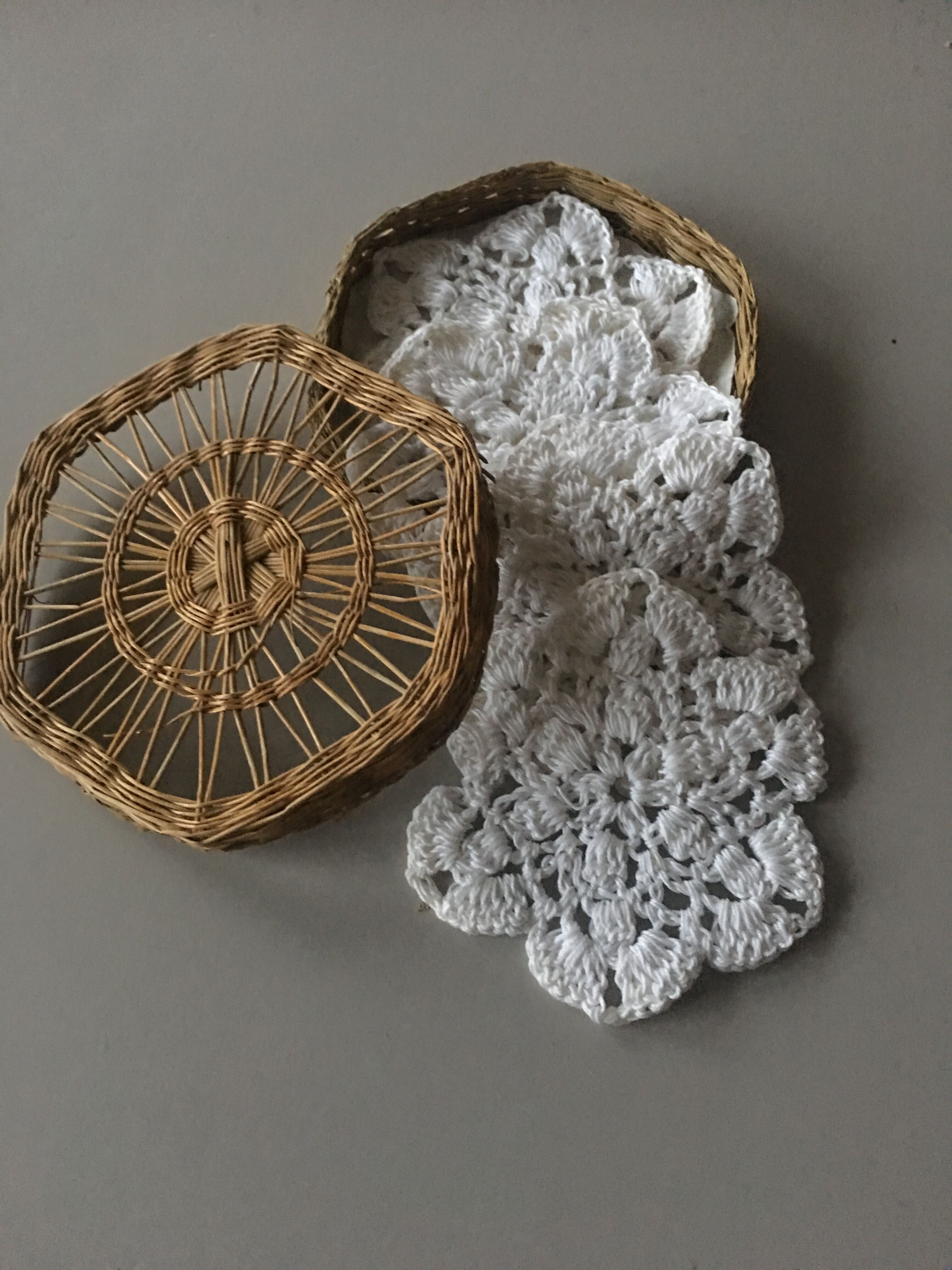 Wicker box with lace doilies