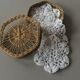 Wicker box with lace doilies