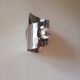 Space Age polished stainless steel wall light from the 1970s