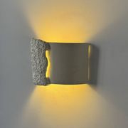Pair of vintage wall lights in smooth plaster and stone imitation, France, 1970.