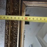 Antique wooden and gilded stucco mirror