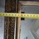 Antique mirror in wood and gilded stucco