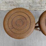 Pair of solid wood tripod stools, carved.