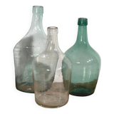 Antique colored demijohns (c.1920). Set of 3 pieces