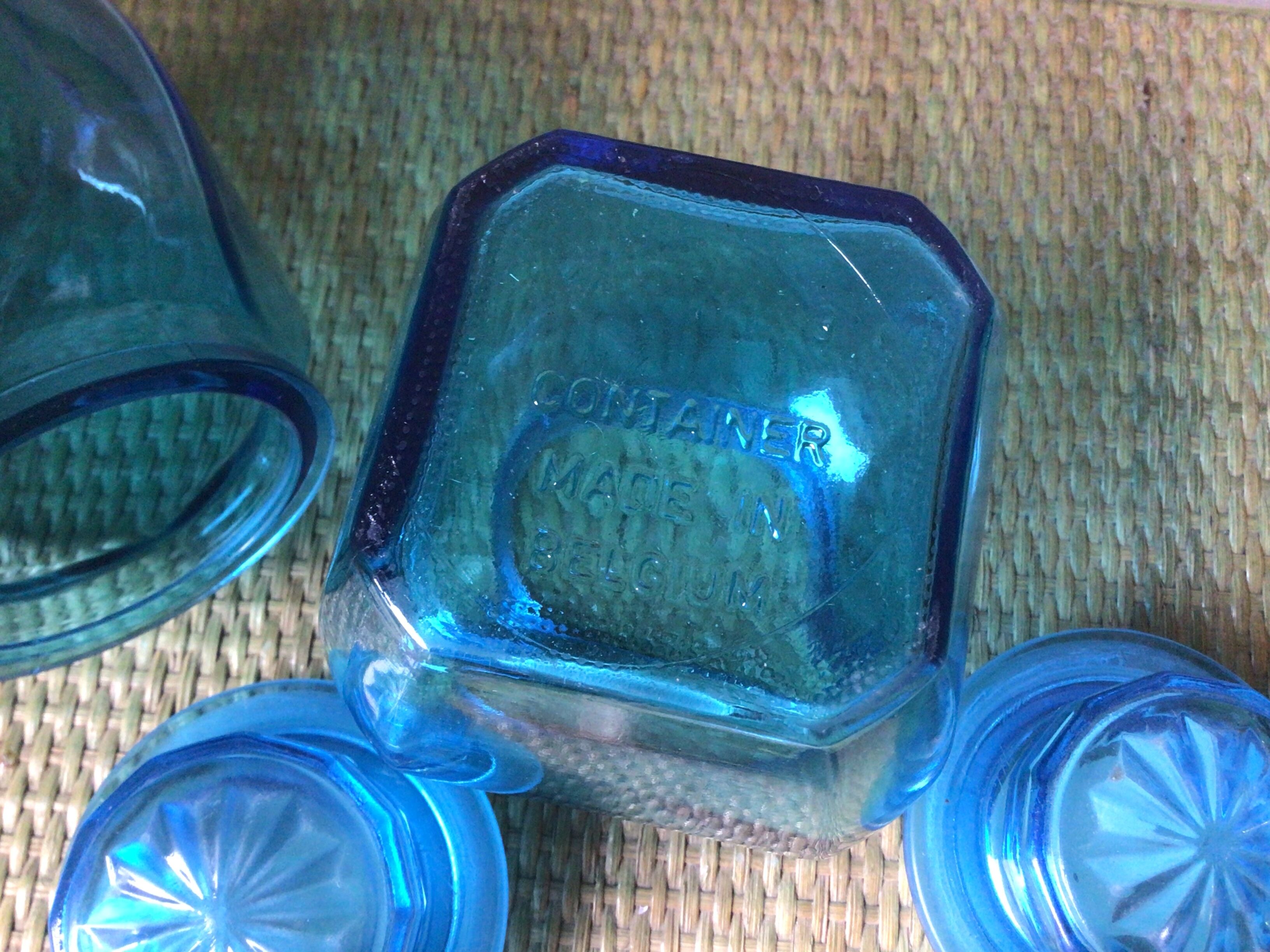 2 blue glass jars