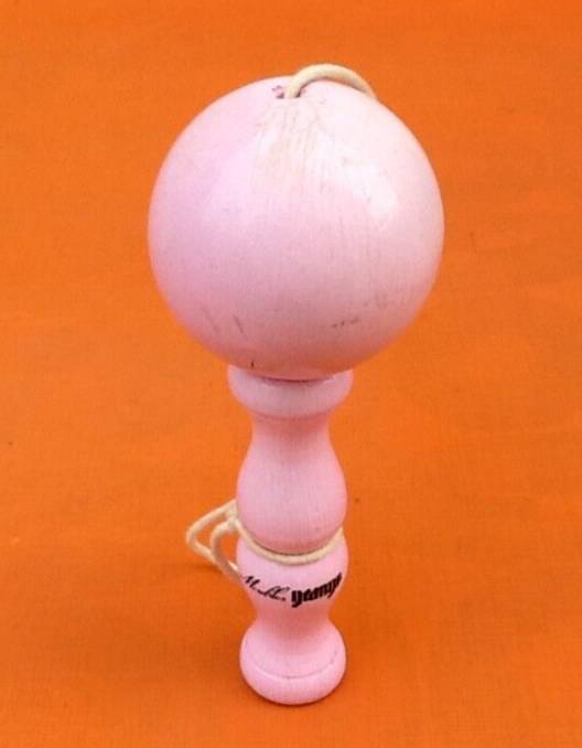 Wooden cup and ball game