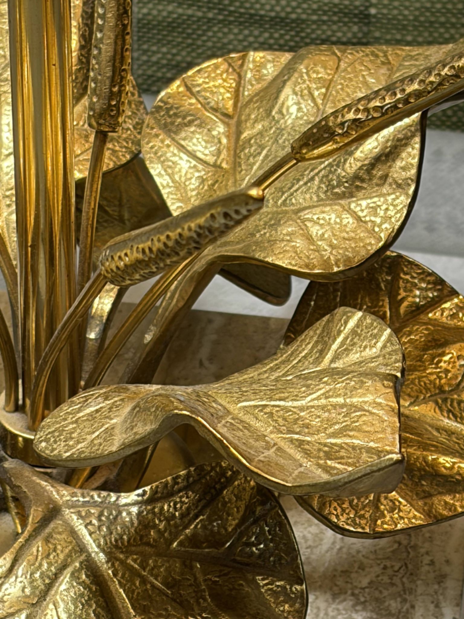 Bronze and travertine water lily lamp attributed to Maison Charles, circa 1970.