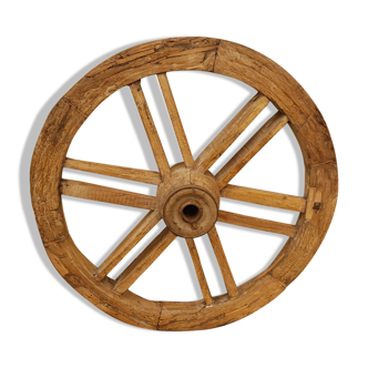 Old teak plow wheel