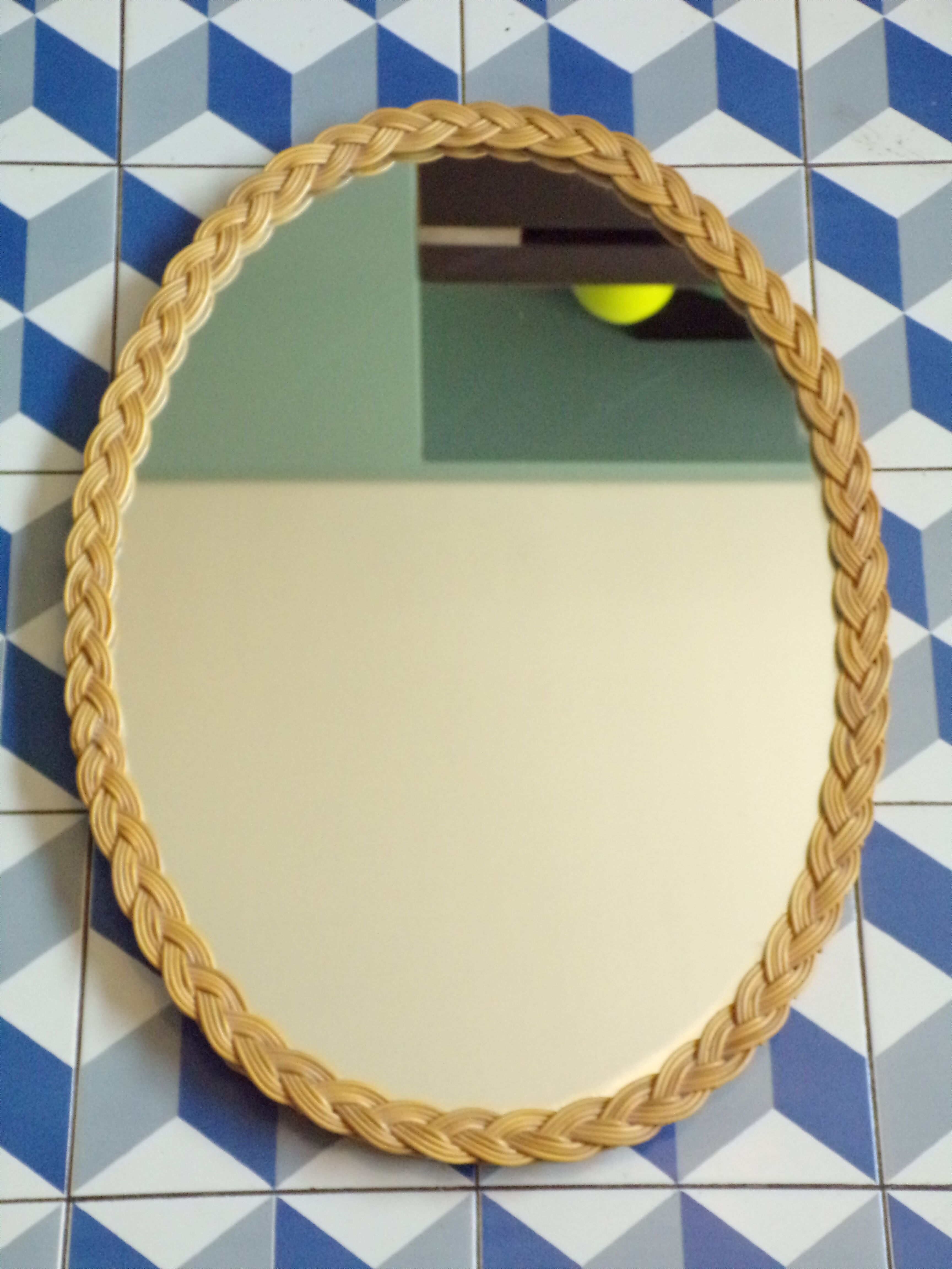 Oval vintage rattan mirror