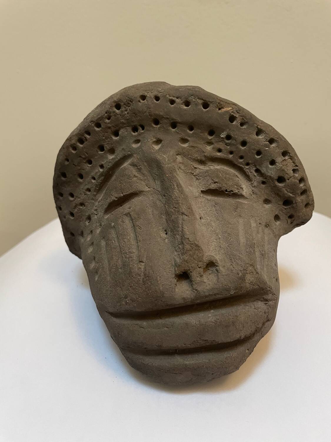 Primitive art head sculpture