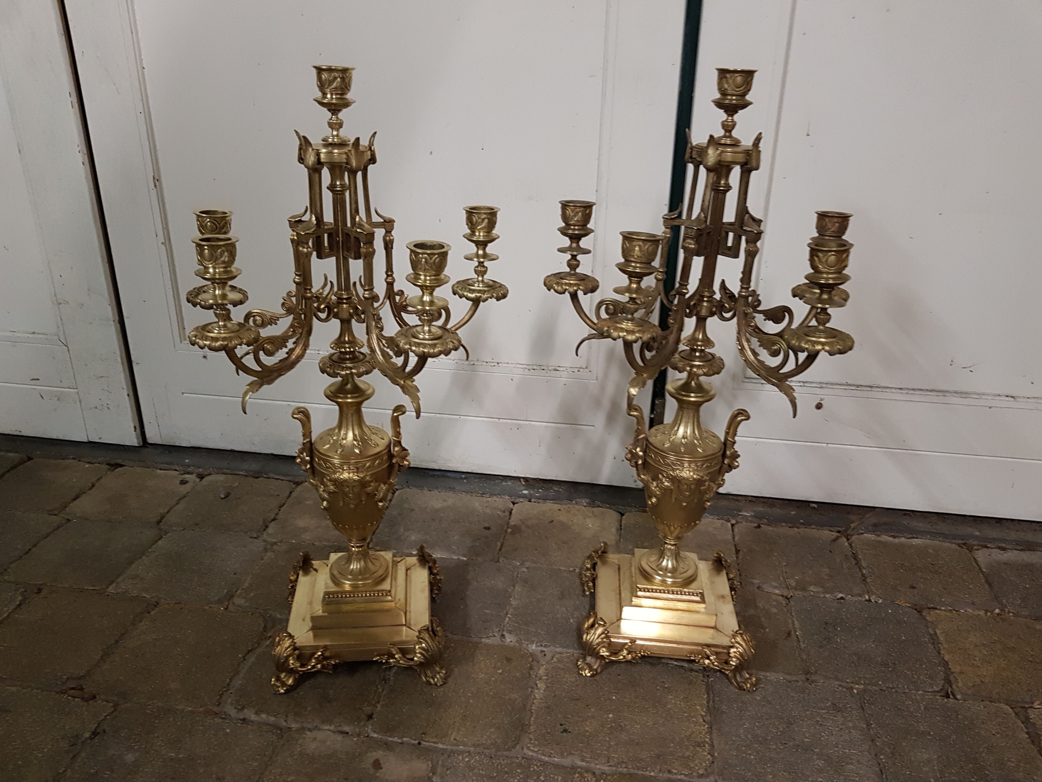 A pair of candle holders
