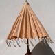 Powder pink paper umbrella and wooden handle
