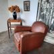 Fauteuil club en cuir , art deco