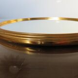 Round mirror tray in 1950s gold metal
