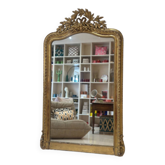 Large antique Louis Philippe gilded mirror with gilded fireplace pediment