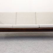 Three-seater modernist teak sofa, France circa 1950.