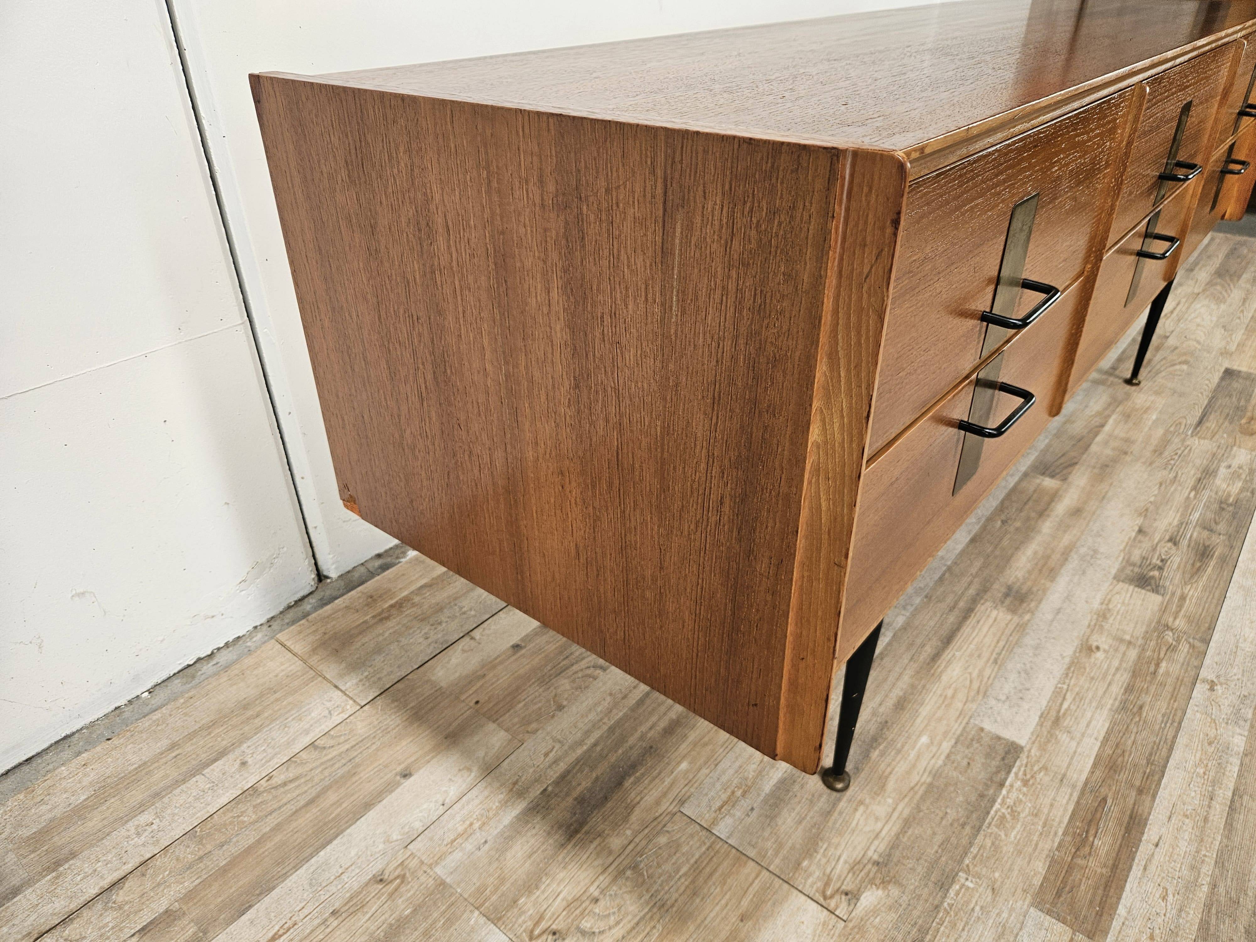 1960s walnut chest of drawers with iron and brass details