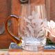 Half-pint mug engraved with floral motifs and with an amber glass handle