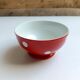 Red bowl with white polka dots in Longchamp ceramic