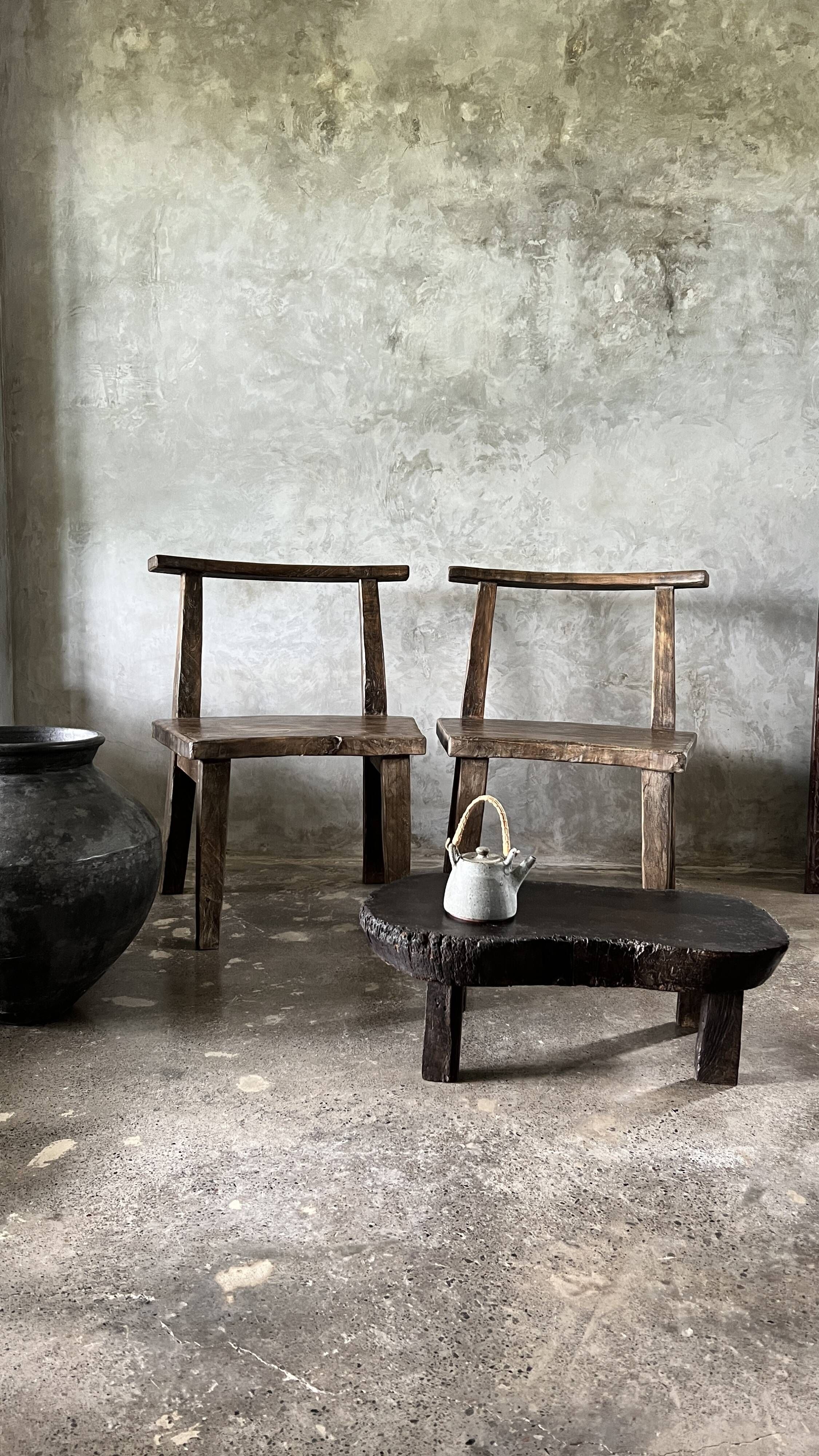 Small old Asian wooden coffee table in Japanese style, kidney-shaped top