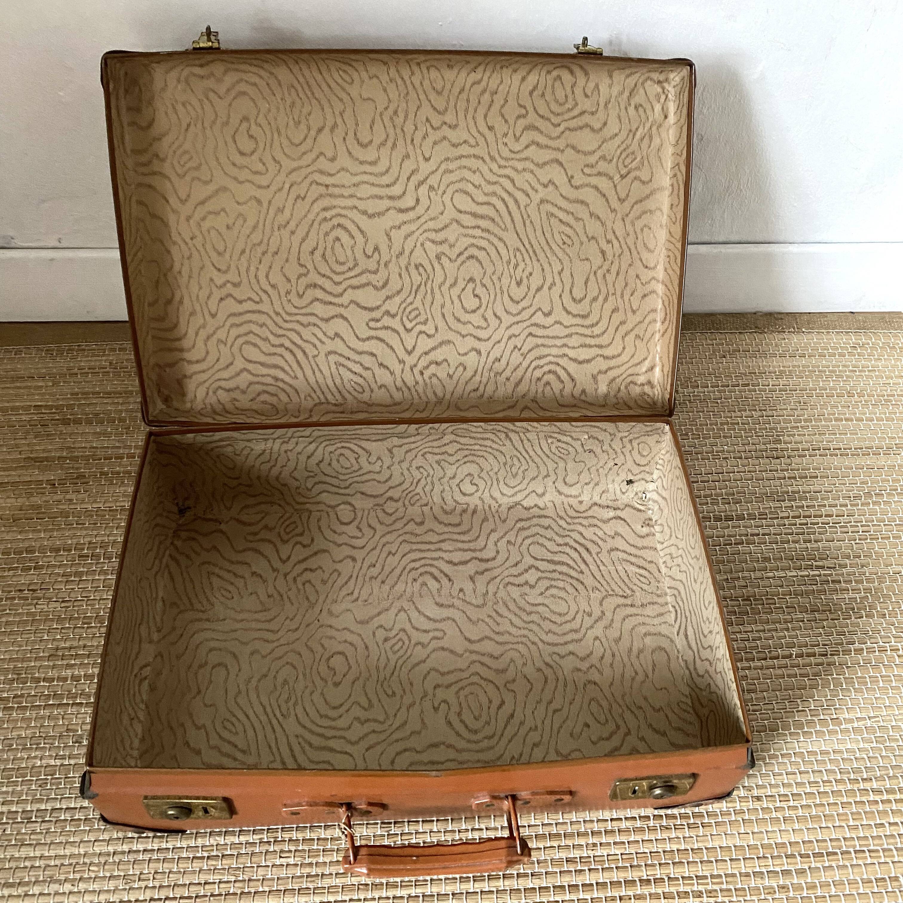 Antique suitcase and its key