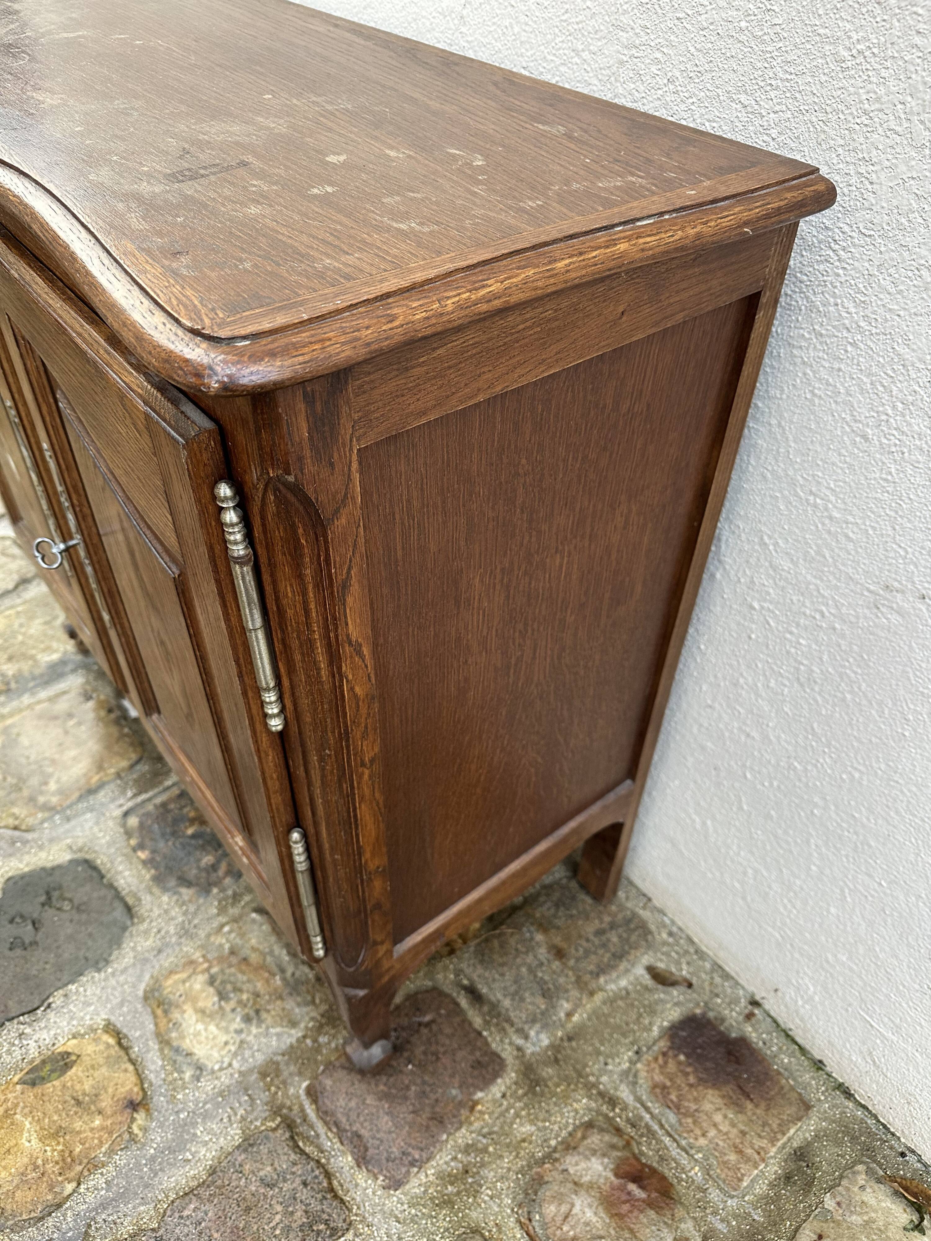 Rustic Louis XV style two-door sideboard