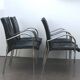 Set of 4 armchairs with chrome base and leather vintage design 1980