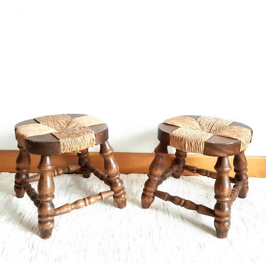 Pair of wood and straw fireplace stools, 1950s