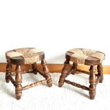 Pair of wood and straw fireplace stools, 1950s