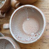 Stoneware coffee service, cups and saucers