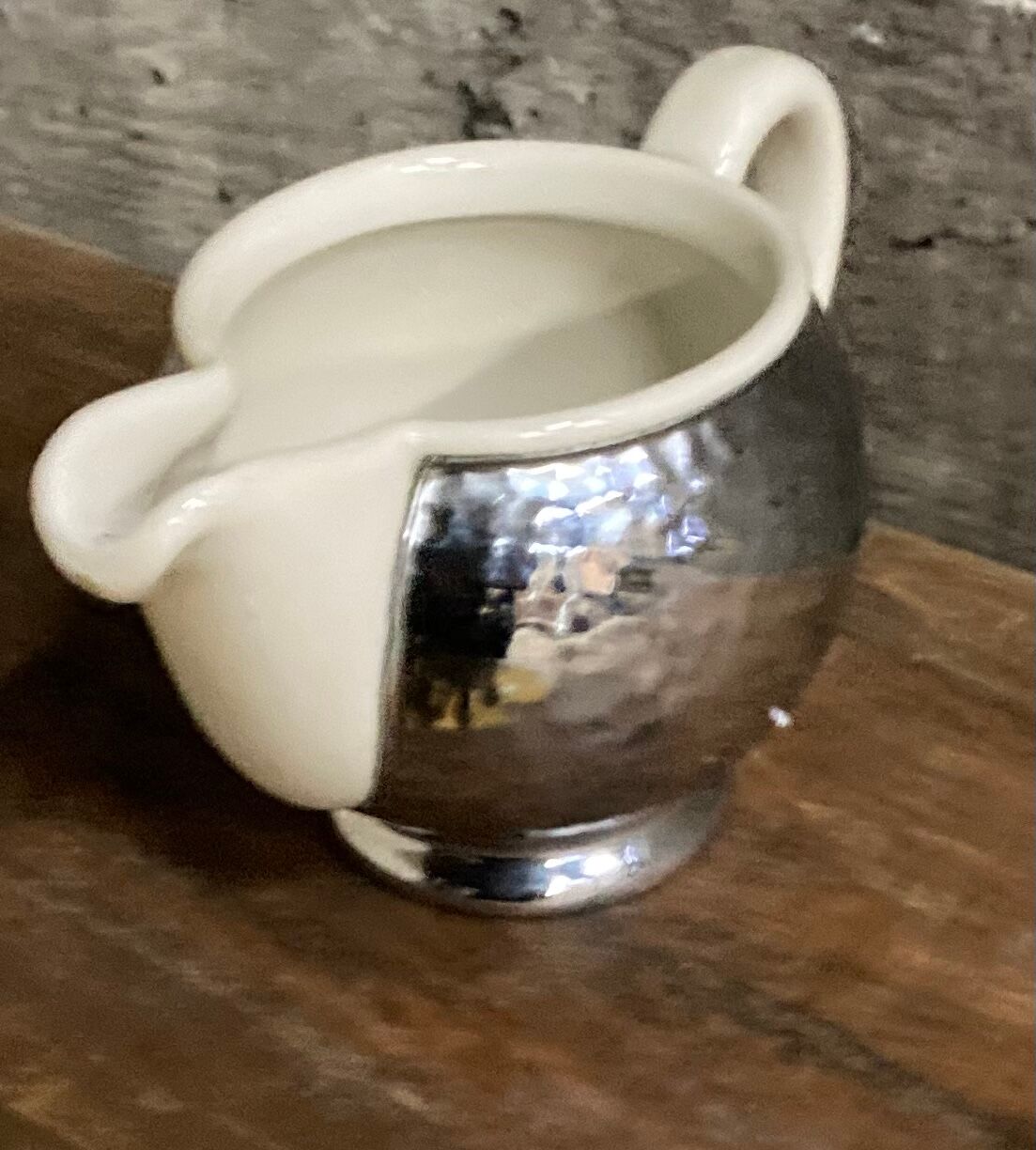 Ceramic/tinned milk jug.