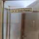 Pair of Italian gold-plated brass wall sconces with beveled glass