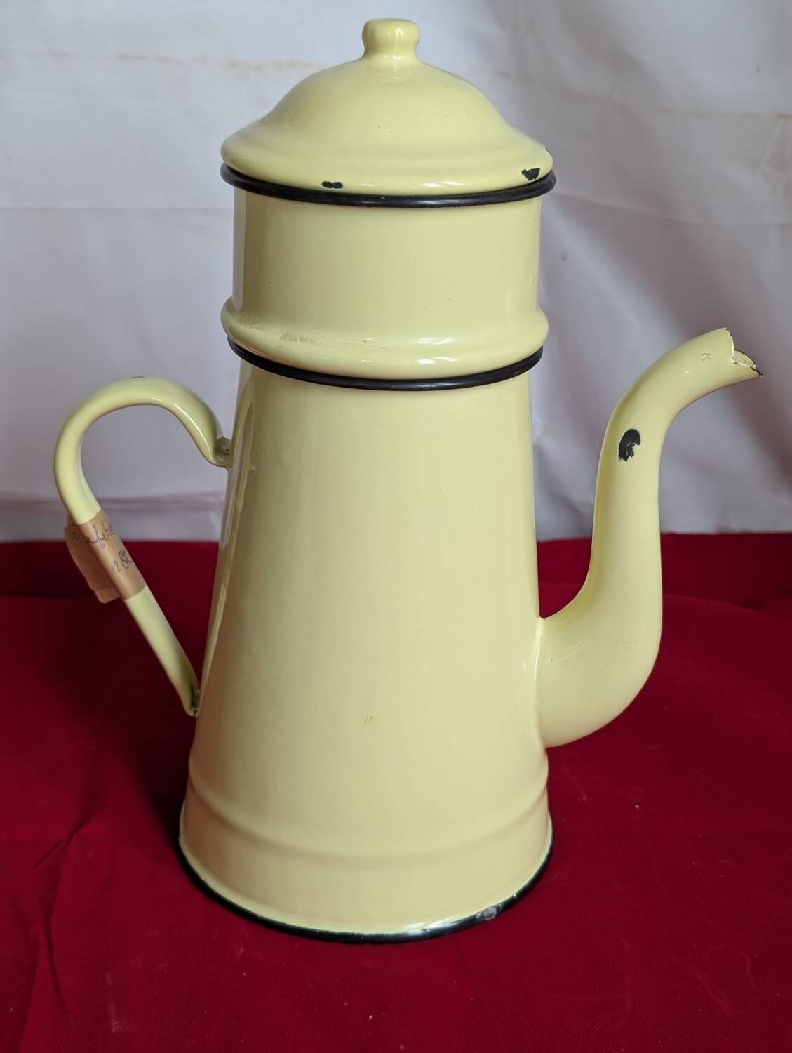 Yellow enameled metal coffee pot