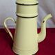 Yellow enameled metal coffee pot