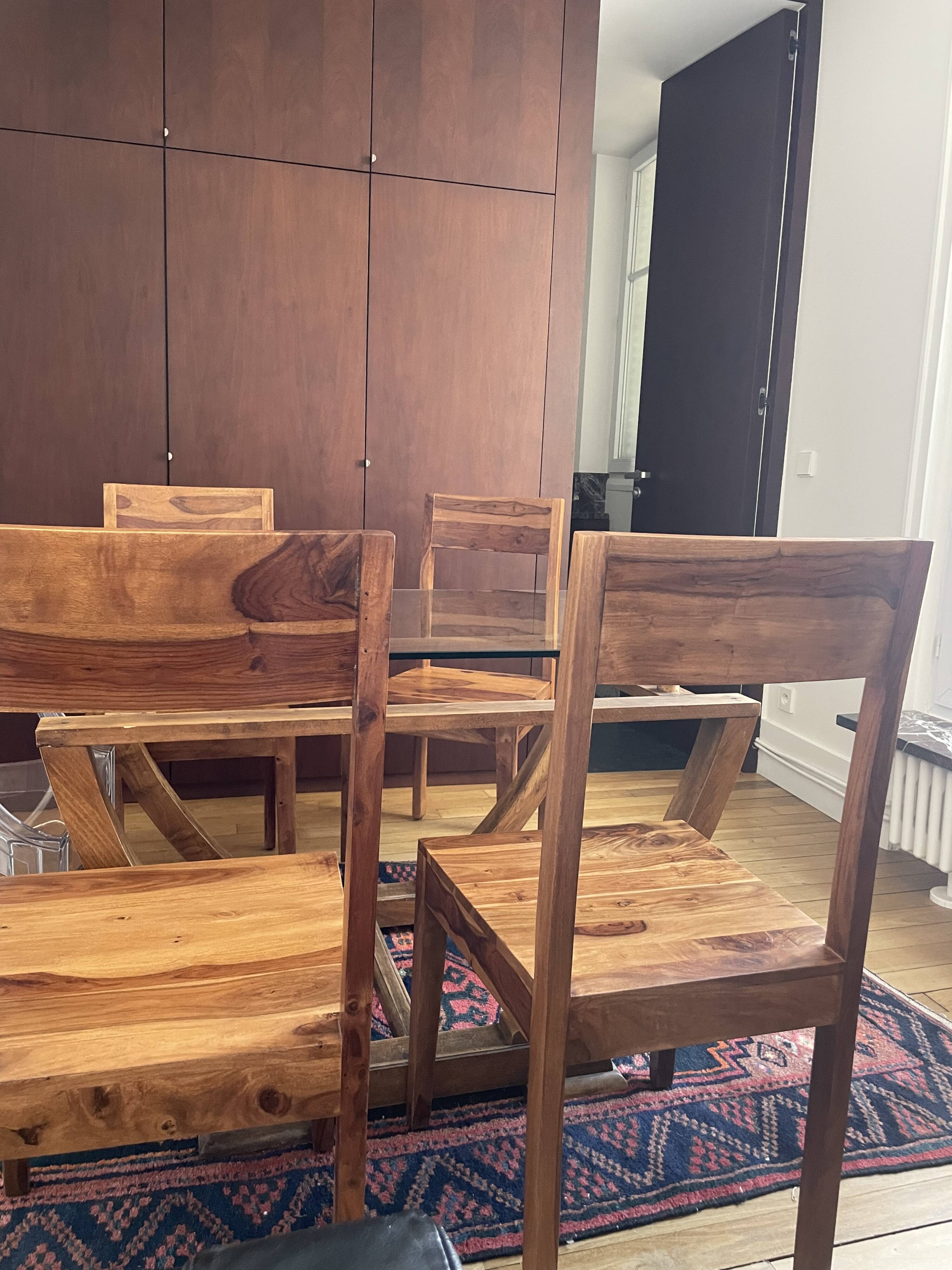 Dining table set with 4 solid wood chairs.