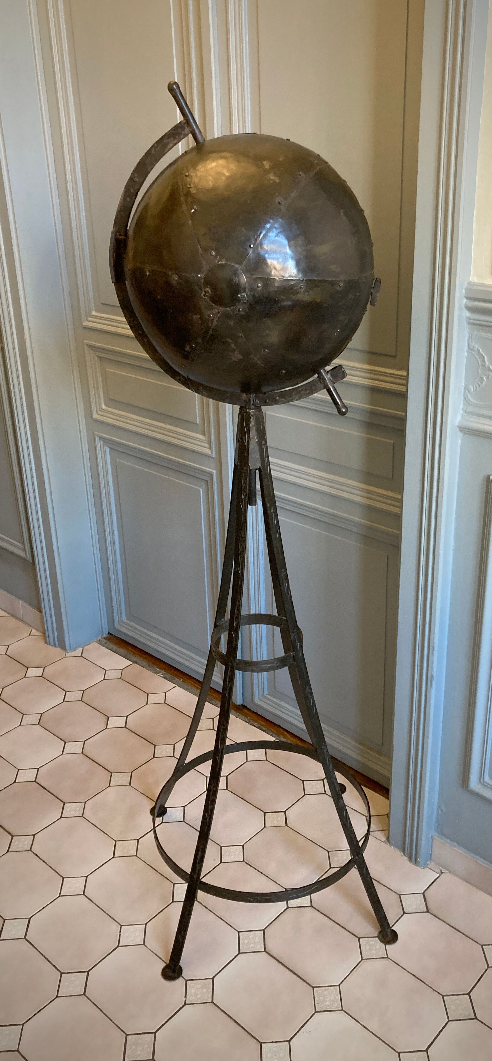 Atypical industrial furniture riveted sphere