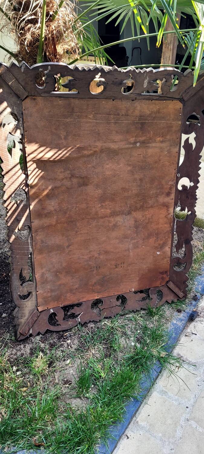Huge antique Indonesian teak mirror