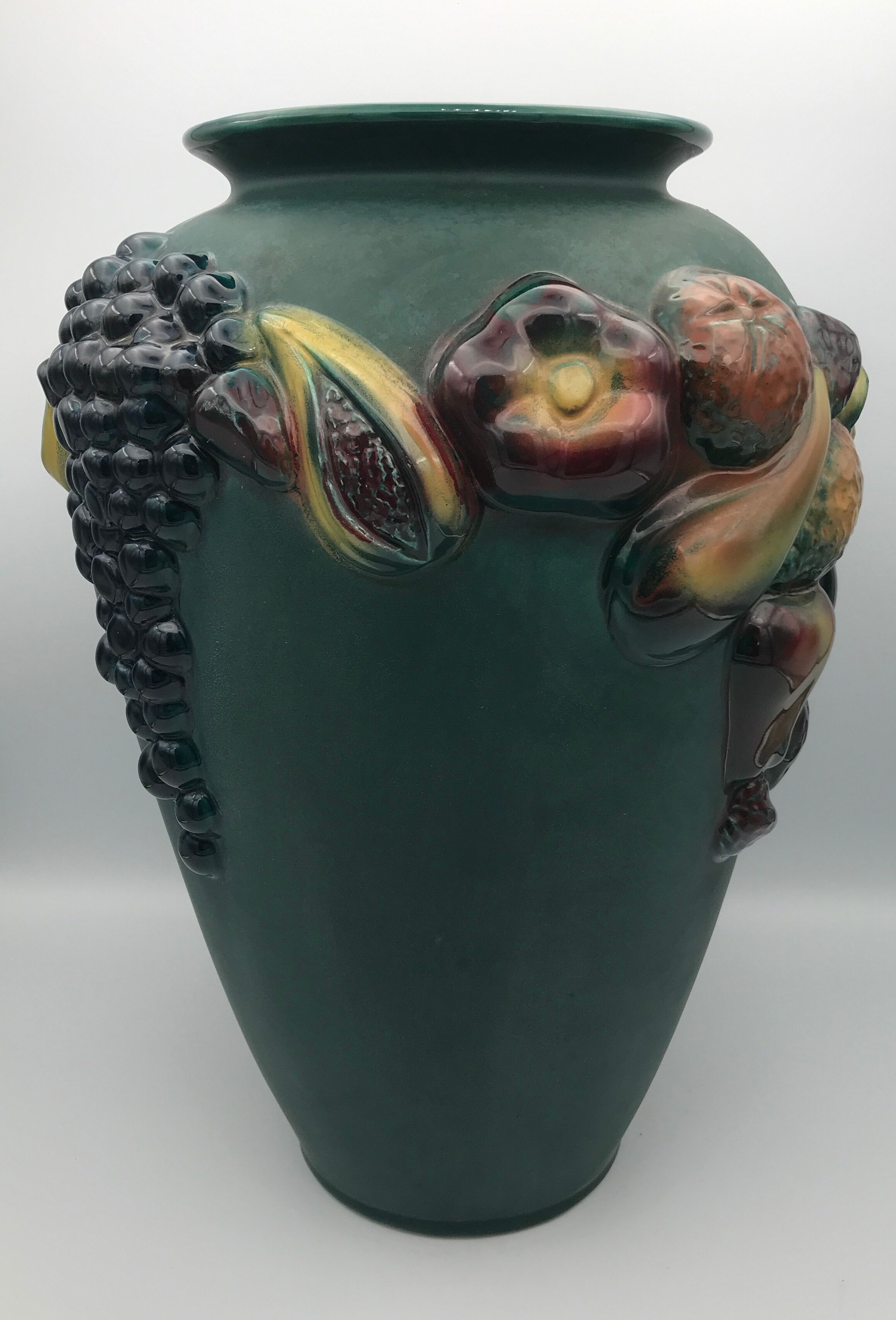 Green ceramic vase with polychrome decoration of fruits and vegetables in relief 33.5 cm