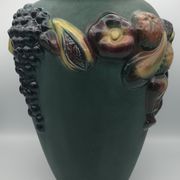 Green ceramic vase with polychrome decoration of fruits and vegetables in relief 33.5 cm