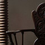 Scandinavian armchair in solid oak with cushion, folk art, early 19th century.