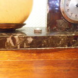 Table lamp with pendulum