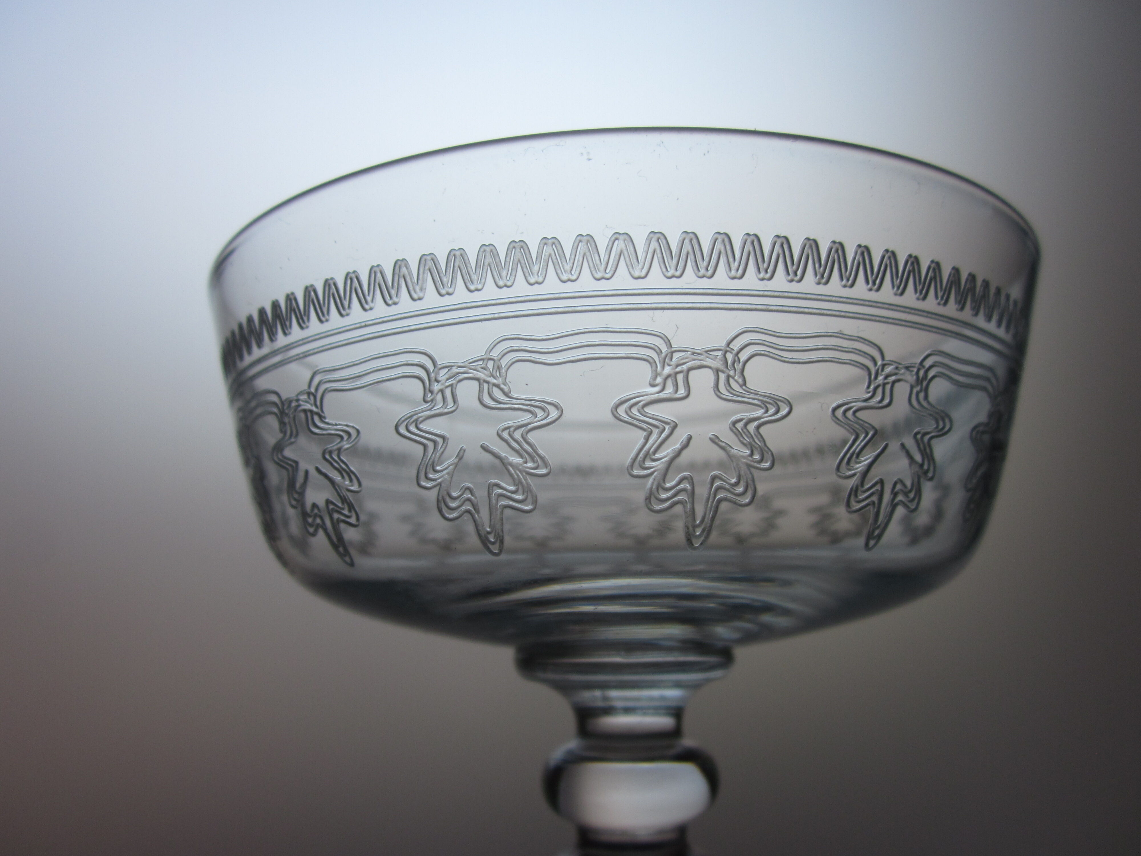 4 old champagne glasses