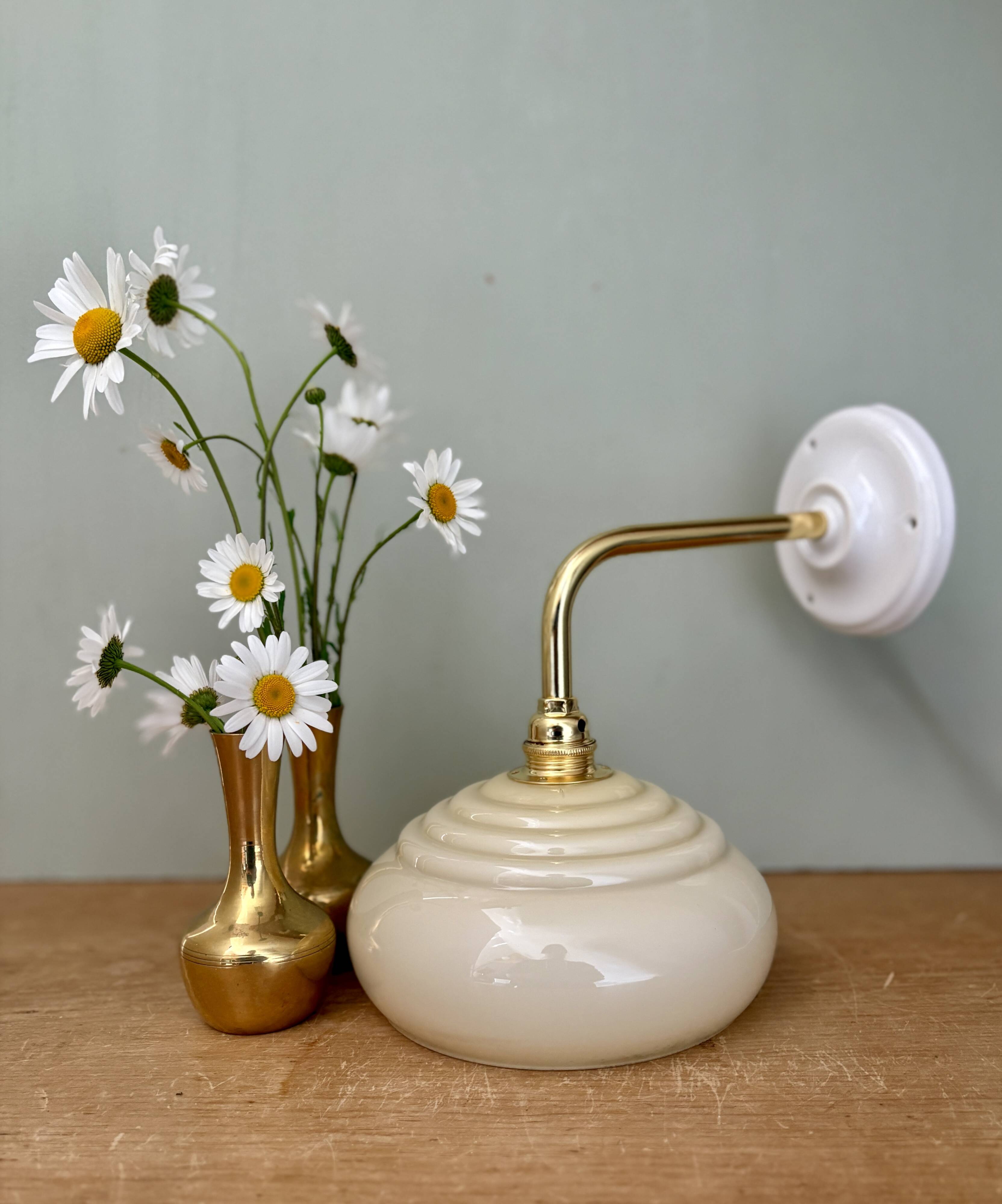 Vintage angled wall lamp with pale yellow opaline shade