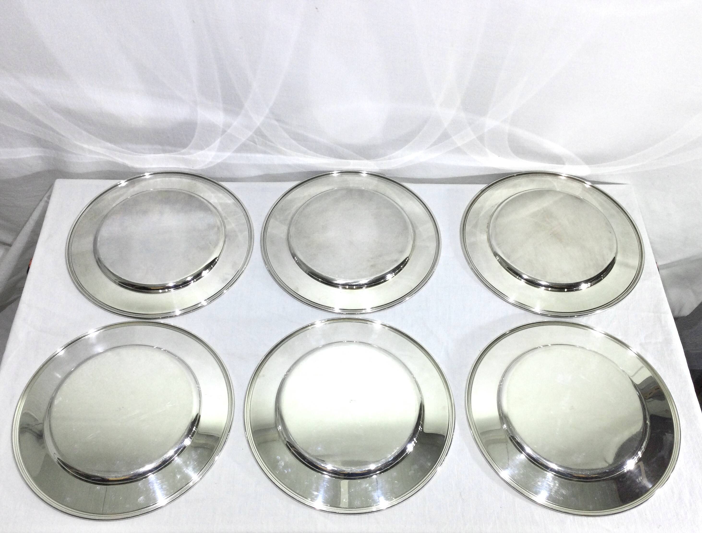 Set of silver-plated serving dishes and bells