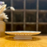 Coupe sur pied ancienne en porcelaine